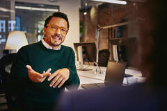 A man in conversation