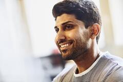 Smiling man in and office