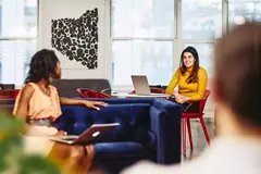 Two female having a conversation
