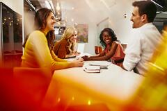 a team discussing something on a table