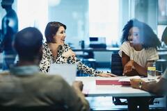 a team having a discussion in the boardroom