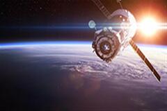 an image of a satellite orbiting the earth
