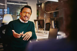 A man in conversation