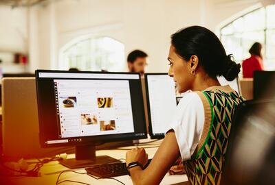 A photo of a woman preparing her digital footprint for work