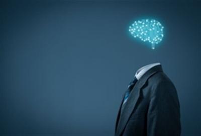 an image of a suit with a floating digitalised brain