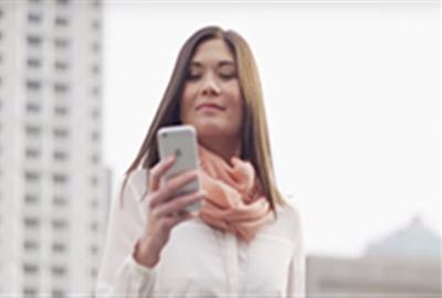 a woman holding a phone