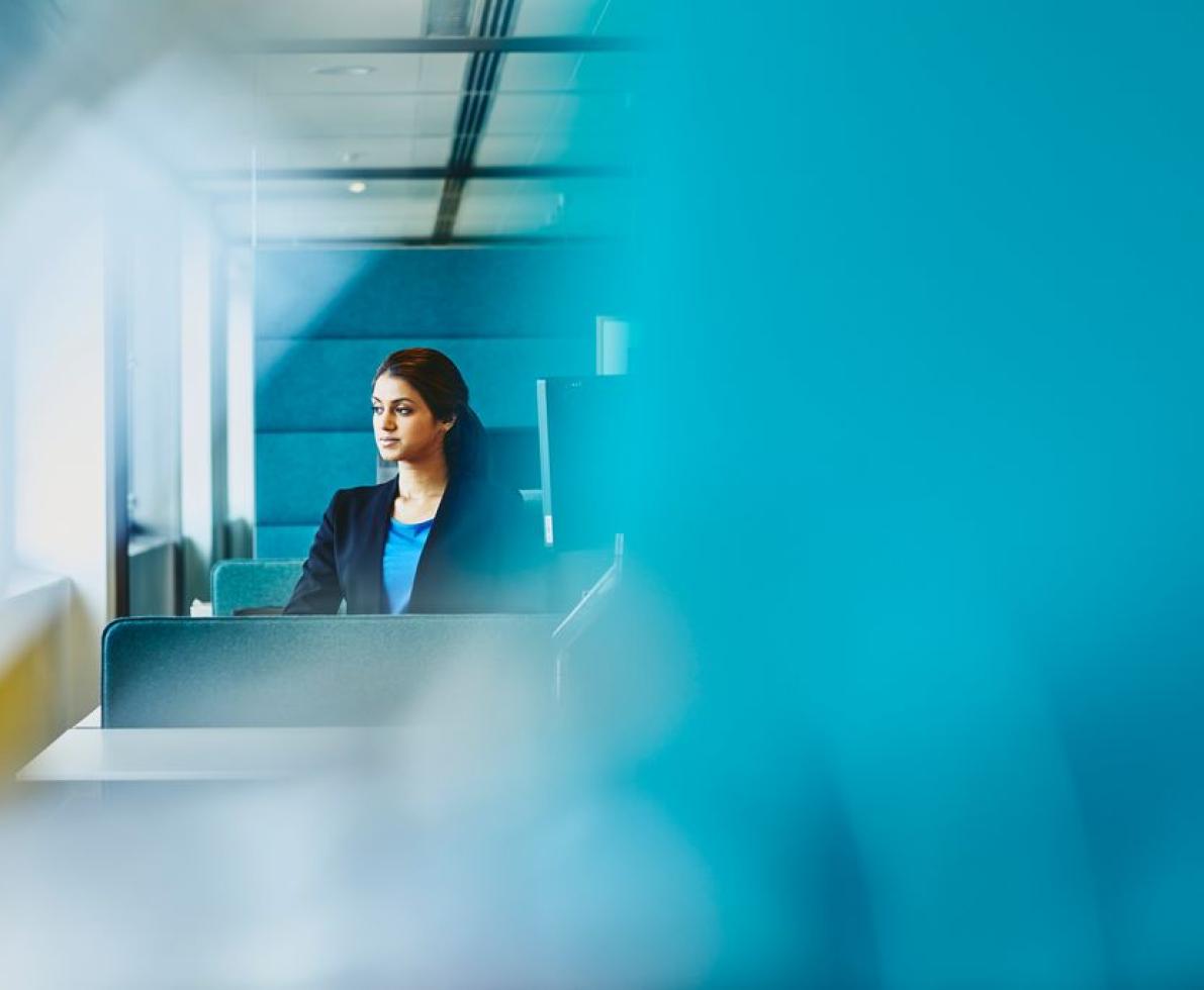 A photo of a woman working as an executive assistant