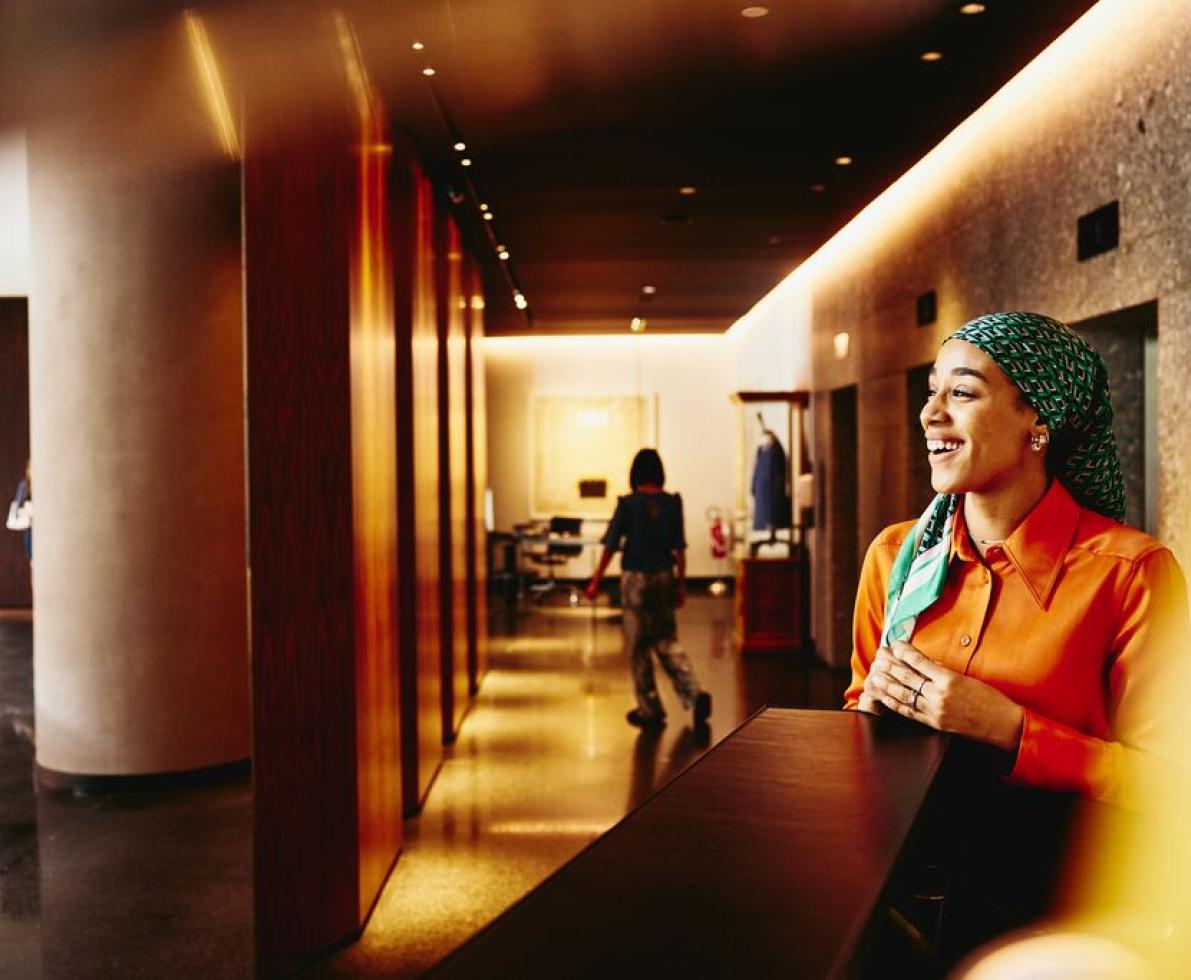 A photo of a woman working in the sales sector