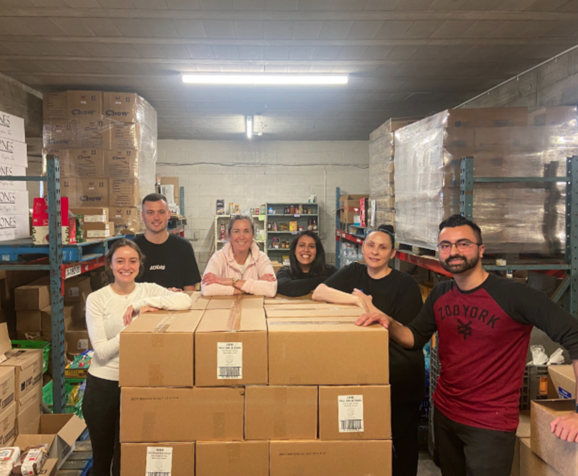 a group photo of employees at city mission