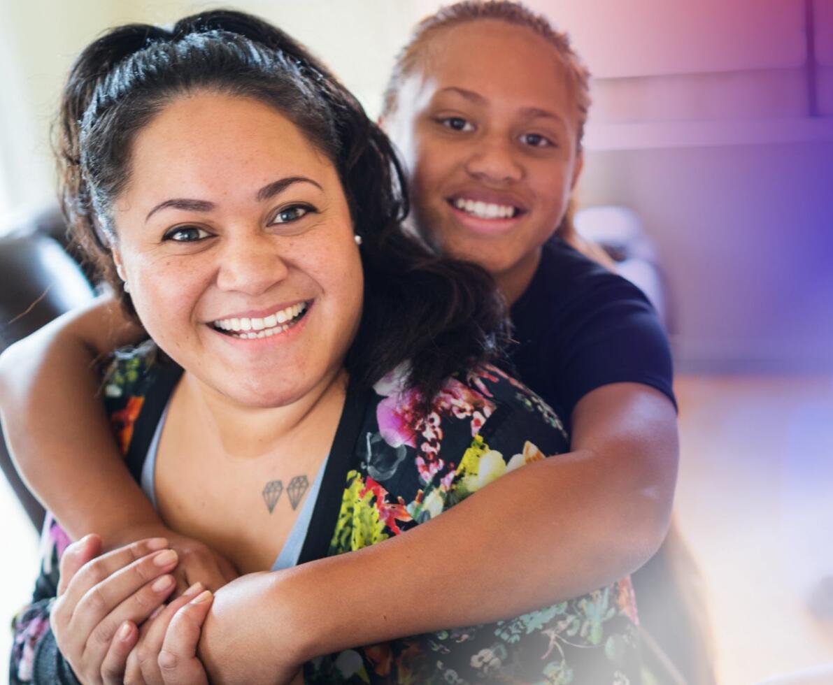 an image of a woman and child smiling