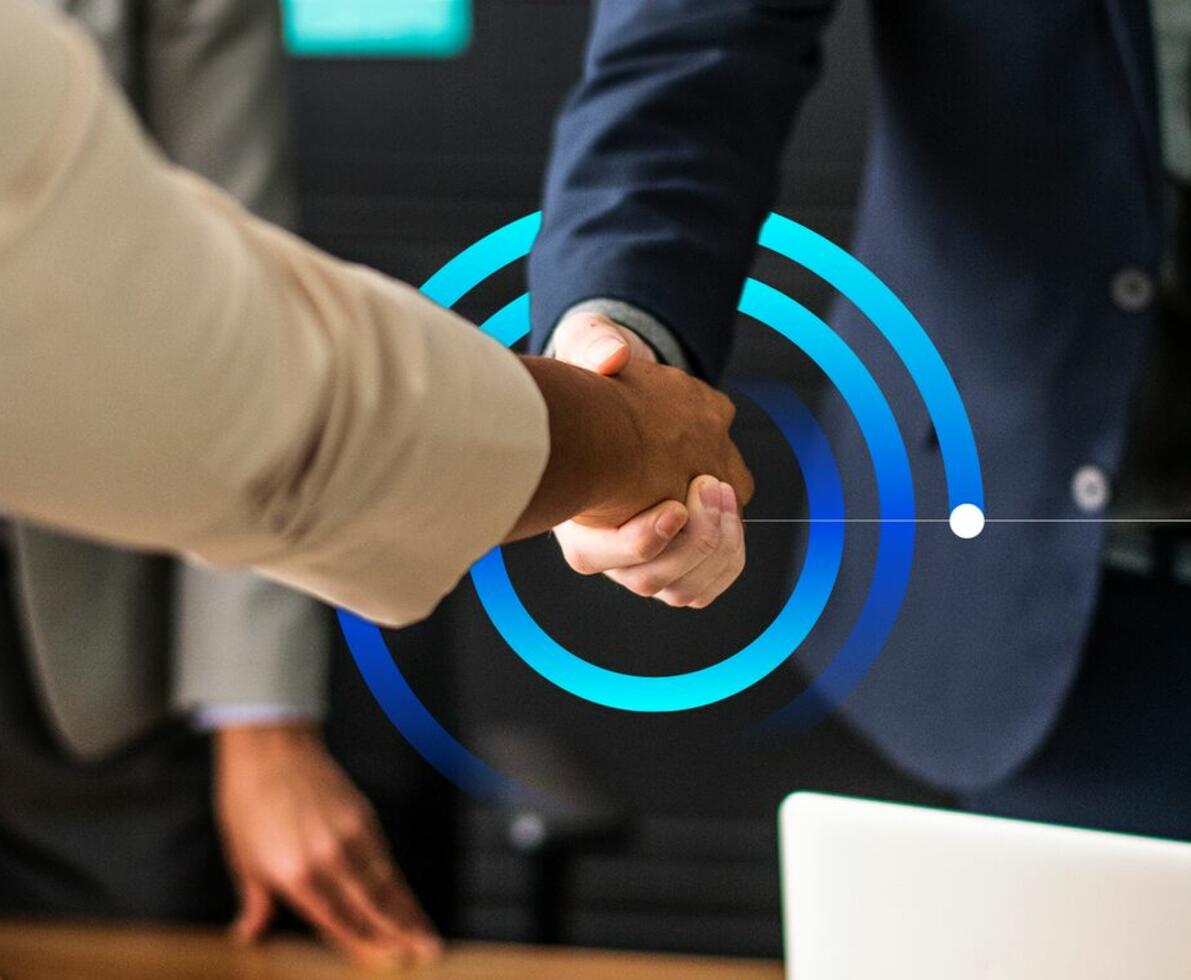 an image of two people shaking hands