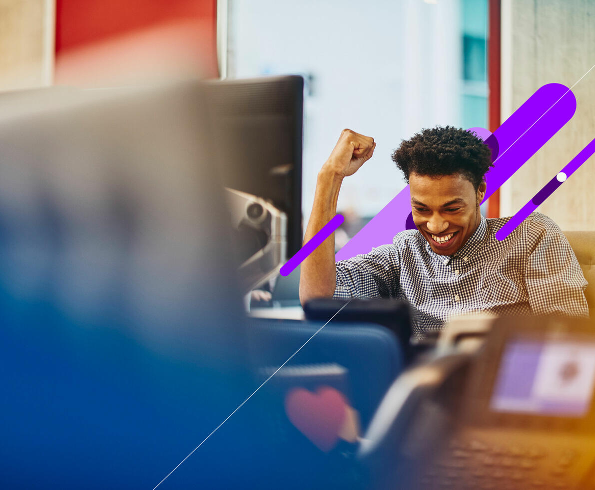 an image of a man doing a fist pump while smiling brightly