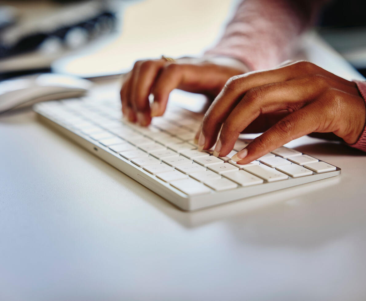 image of someone typing on a keyboard