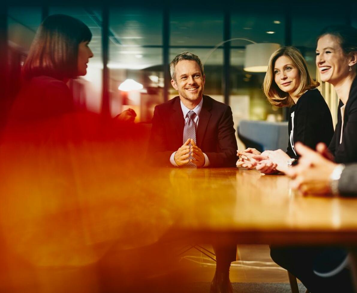 an image of a group of people in a meeting