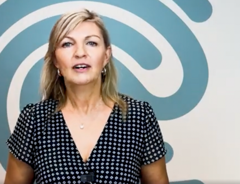 blonde woman speaking to the camera