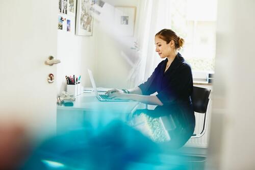 A photo of a woman working in the information technology sector