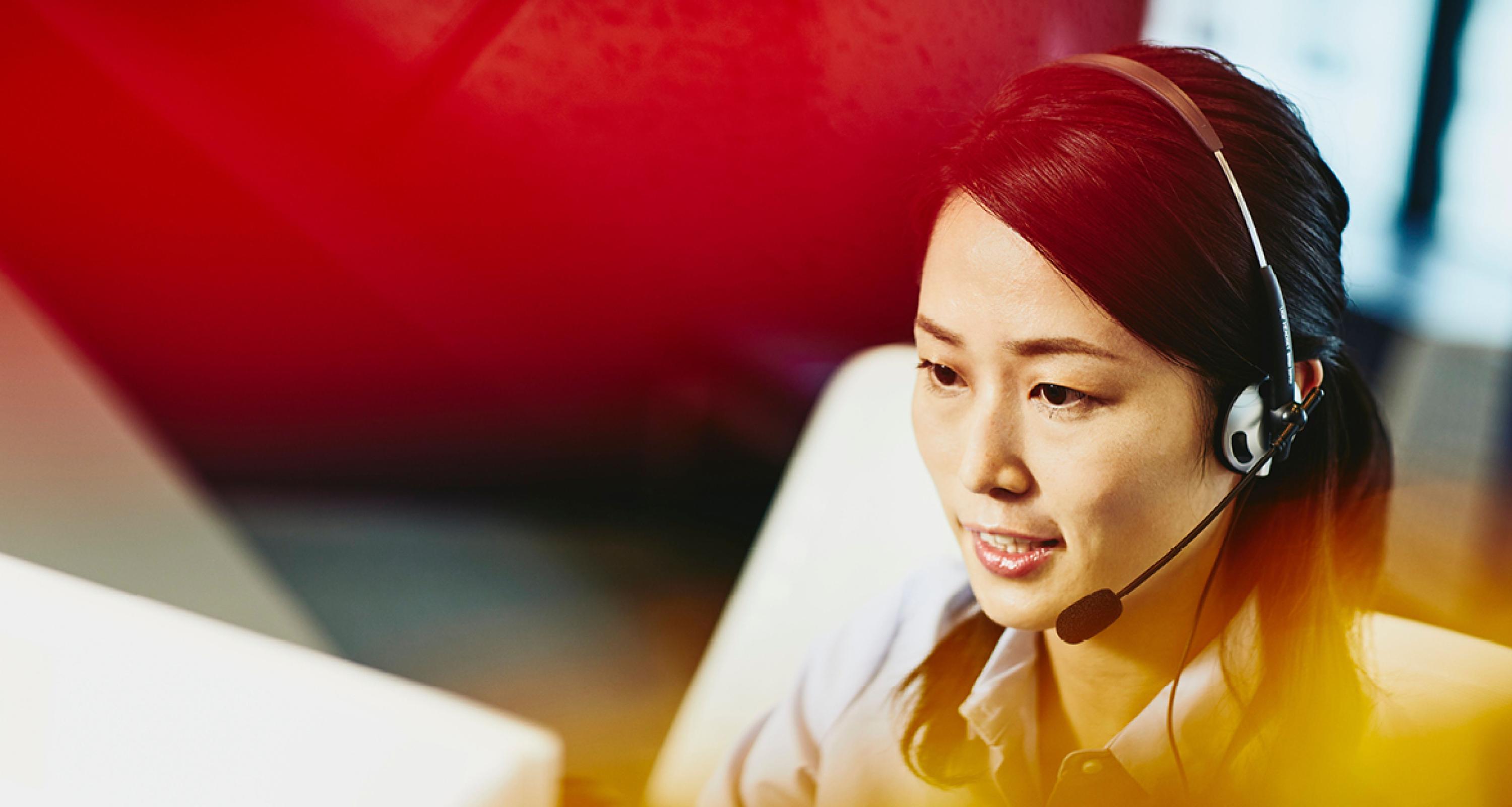 A photo of a woman working in customer service sector