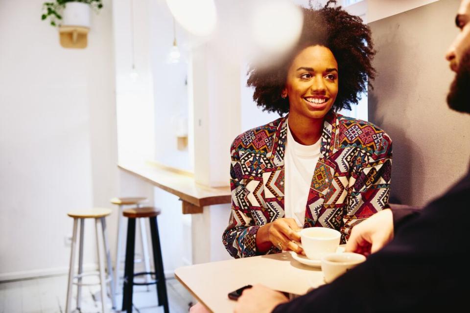 A photo of a woman preparing for a job interview.