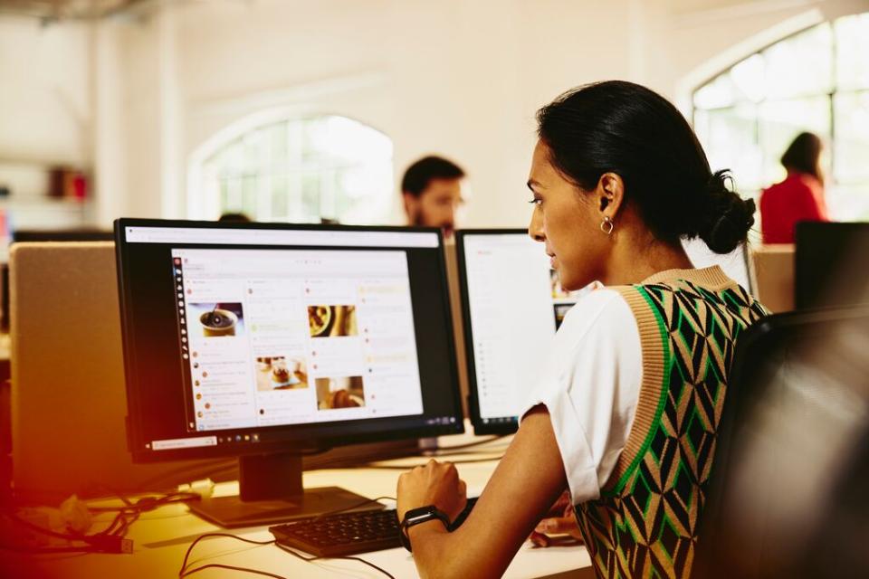 A photo of a woman preparing her digital footprint for work