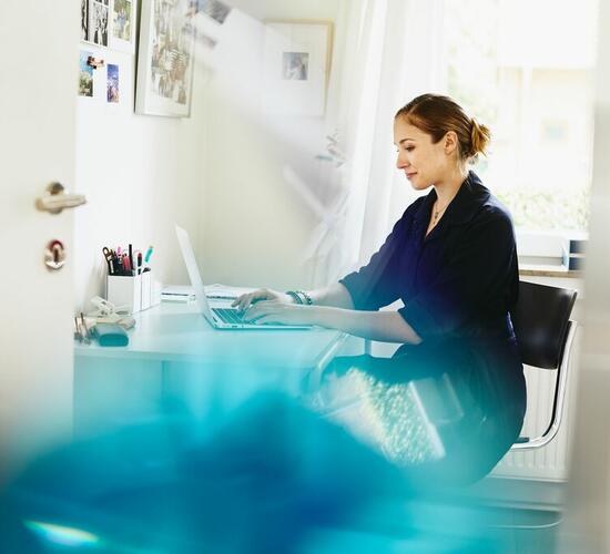 A photo of a woman working in the information technology sector